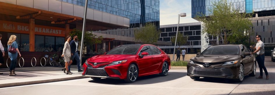 Two 2019 Toyota Camry models parked next to each other.